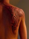 tribal tat on shoulder